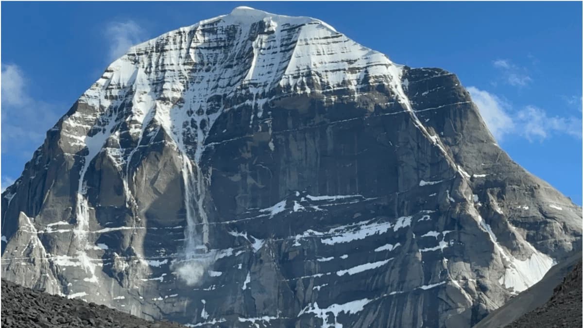 Majestic view of Mount Kailash with snow-covered ridges, seen during the Kailash Mansarovar Yatra.